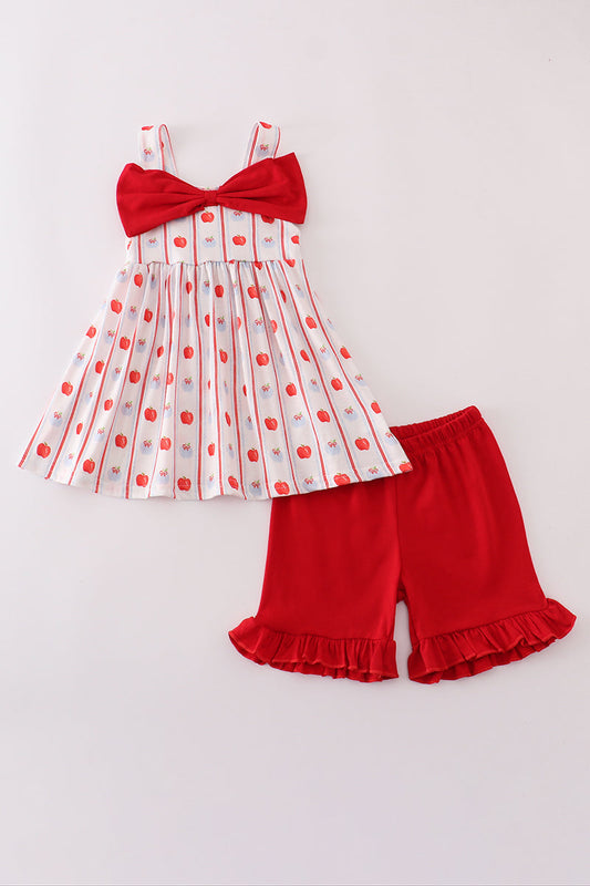 Girls' red apple print shorts set with bow and ruffle trim by Cloudling Kids Clothing.