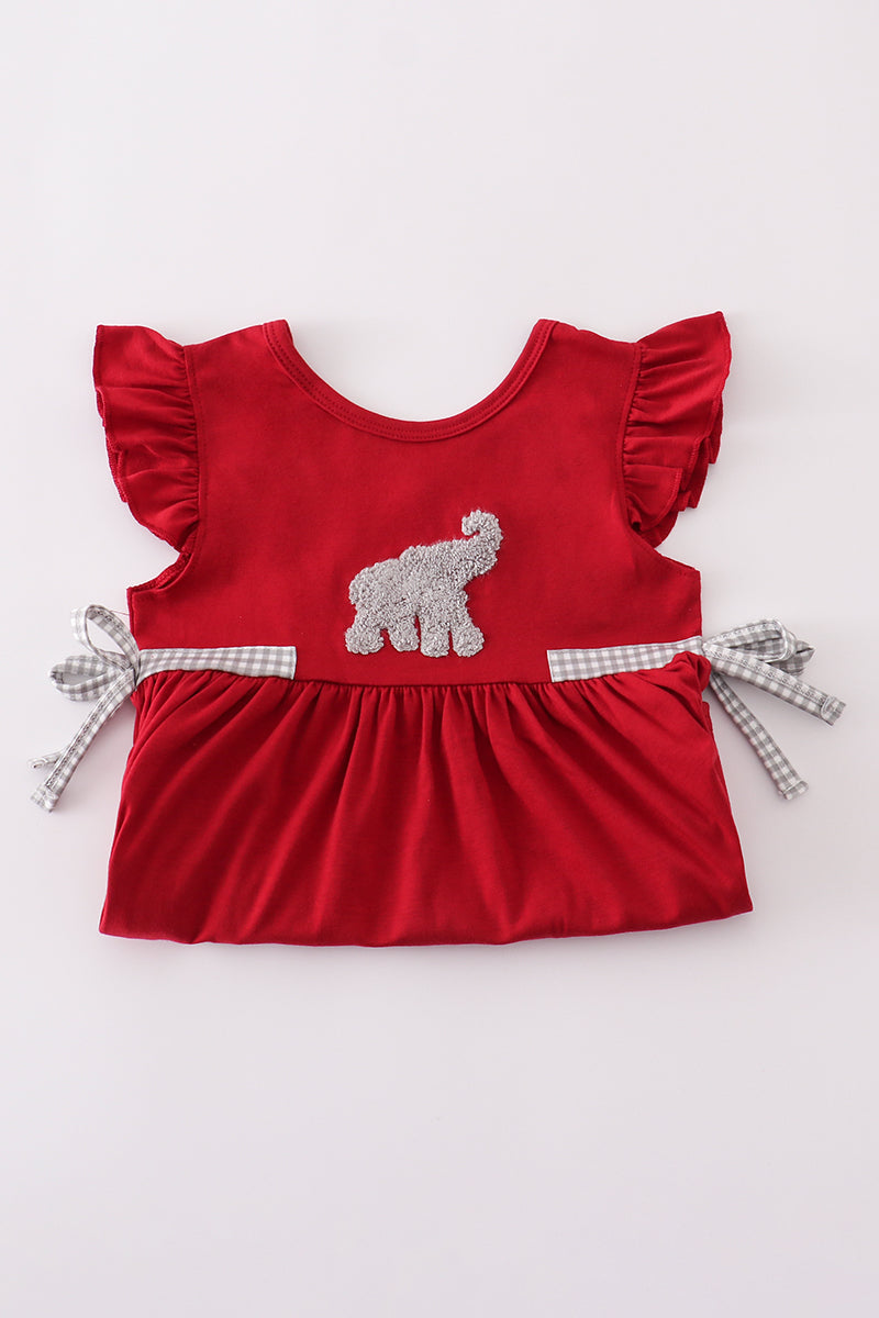 Close-up of a French knot Alabama elephant on a girls' ruffle shorts set.