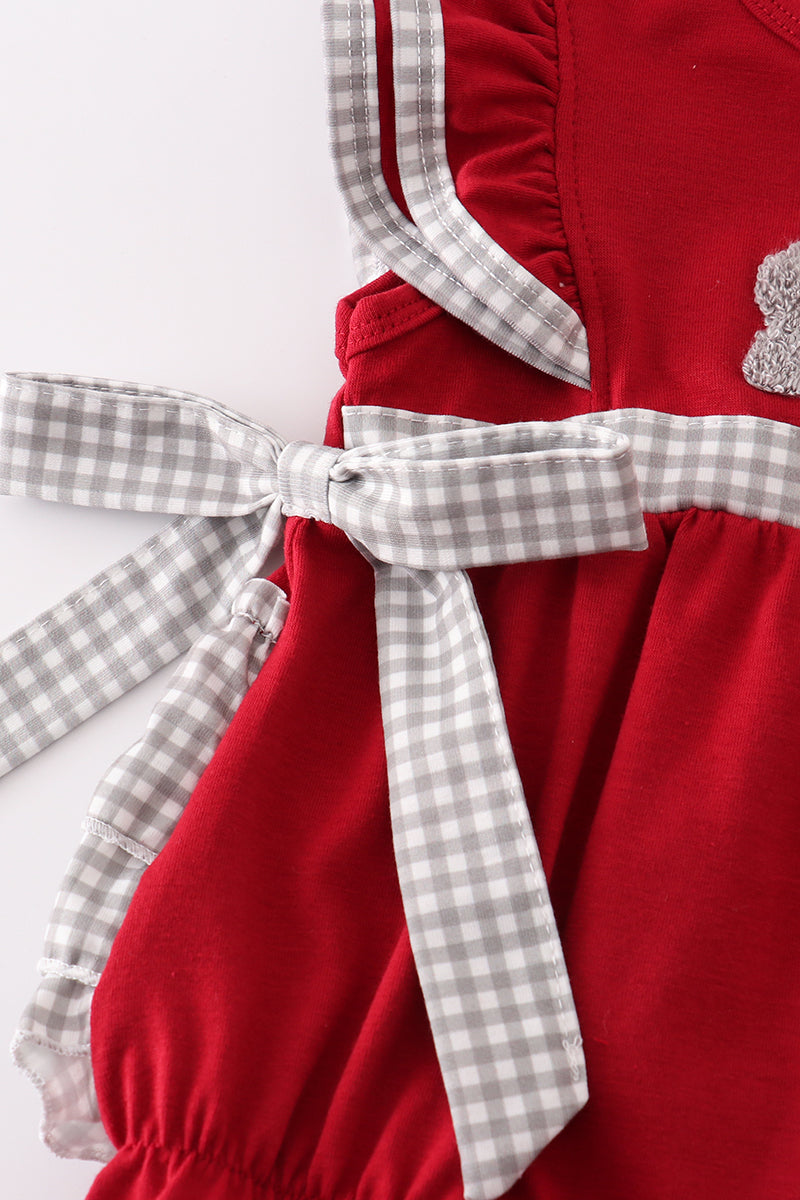 Close-up of a French knot Alabama elephant on a girls' ruffle bubble.