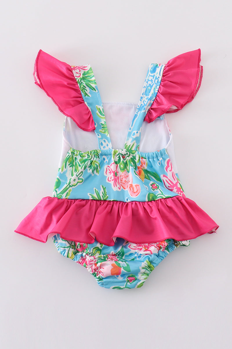 Adorable girls' pink swimsuit featuring a floral print, character appliqué, and Minnie-inspired ears.