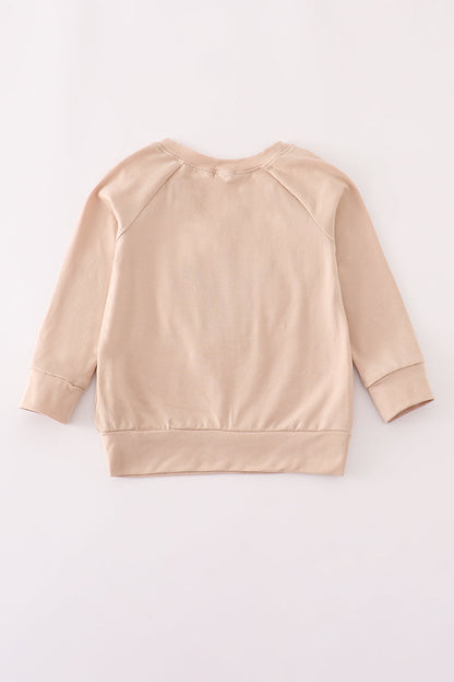 Beige turkey french knot top