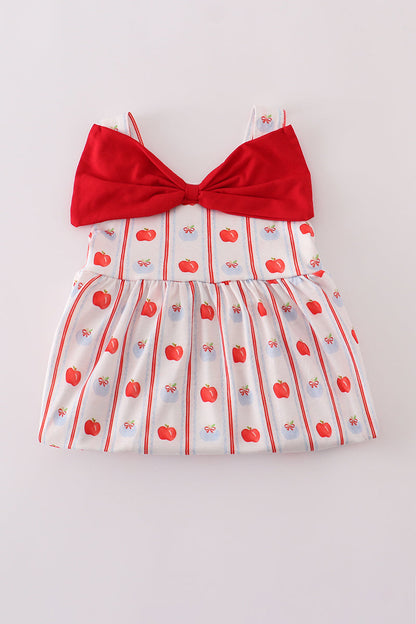 Adorable girls' red dress featuring a sweet apple print and decorative bow.