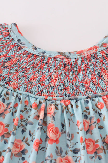 Close-up of smocking and blue floral fabric on baby bloomer set – Cloudling Kids Clothing