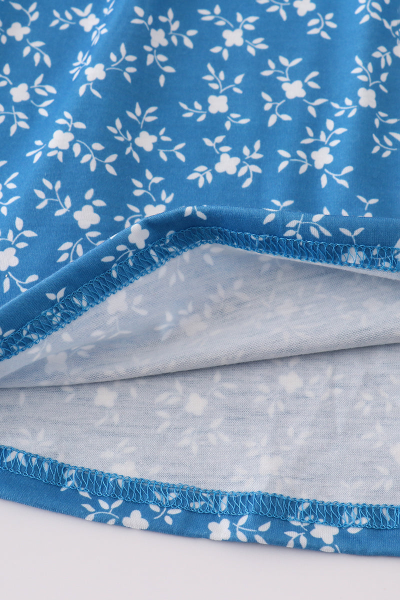 Kids summer dress: blue floral print with delicate smocking.