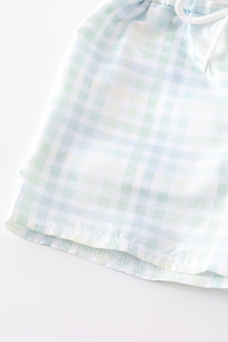 Toddler boy's comfortable green plaid swim shorts.