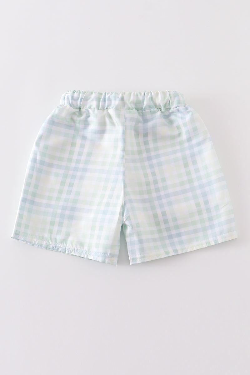 Kids green plaid quick-dry swim trunks.