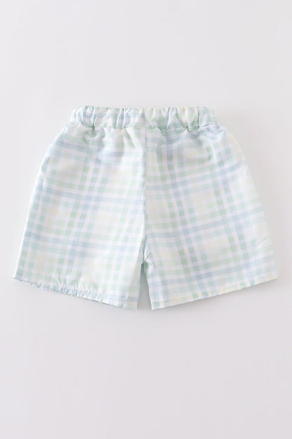 Kids green plaid quick-dry swim trunks.