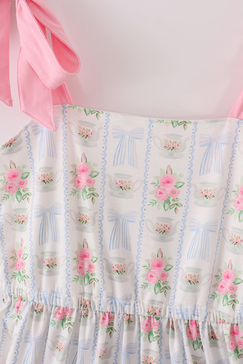 Cloudling Kids Co. women's floral print dress with bow and ruffles.