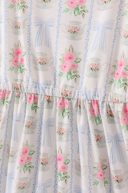 Elegant women's floral midi dress with a bow and ruffles, perfect for spring/summer.