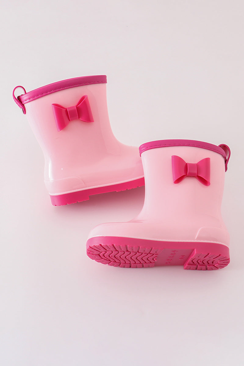cute pink rain boots with bow accents from Cloudling Kids, ideal for rainy weather.