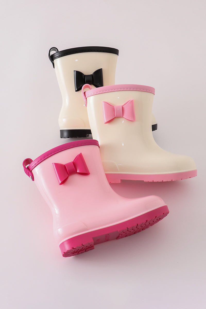 cute pink rain boots with bow accents from Cloudling Kids, ideal for rainy weather.