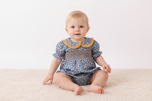 Navy floral smocked ruffle bubble