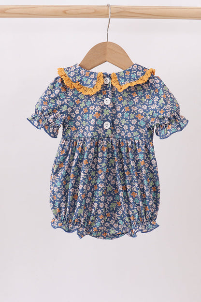 Navy floral smocked ruffle bubble