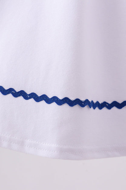 White flag smocked ruffle dress