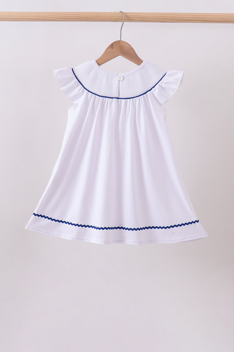 White flag smocked ruffle dress